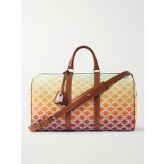 CELINE HOMME - Medium Voyage Leather-Trimmed Logo-Print Coated-Canvas Holdall - Men - Yellow