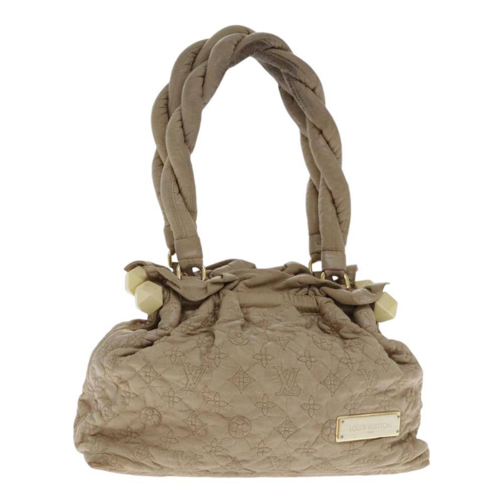 Louis Vuitton Vintage Louis Vuitton Olympe W 34cm x H 24cm x D 13cm - Håndtasker hos Magasin.