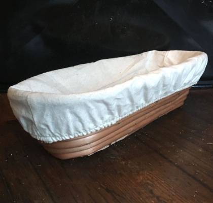 Oval jäskorg i PIL med överdrag i textil
