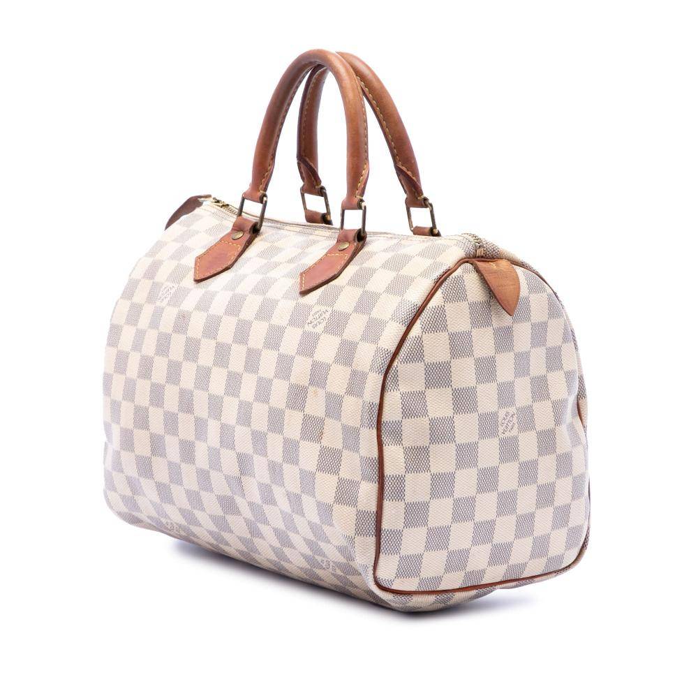Louis Vuitton Vintage Louis Vuitton Speedy L 22cm x W 31cm x D 18cm - Håndtasker hos Magasin.