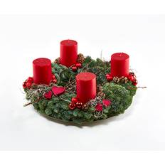 Adventskrans med røde bloklys