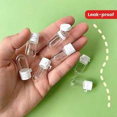 10 st vita reseflaskor i glas med fällbart lock och RFID-skyddsteknik - 3,2 tums bärbara läckagesäkra behållare för toners, lotioner, kosmetika - Åter - Multifärgad (1,5 ml * 10 st)