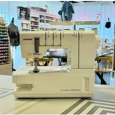 Begagnad Janome 2000CPX Covermaskin