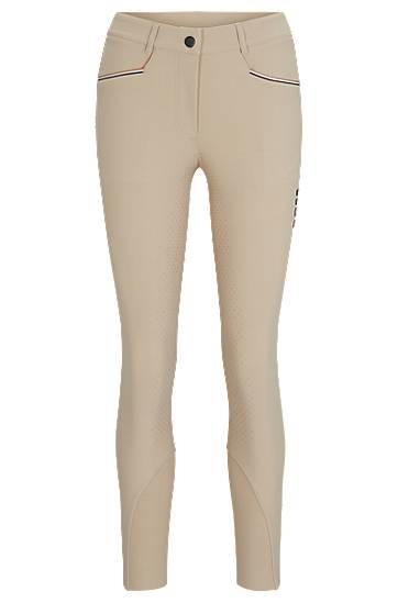 Equestrian full-grip breeches in power-stretch material