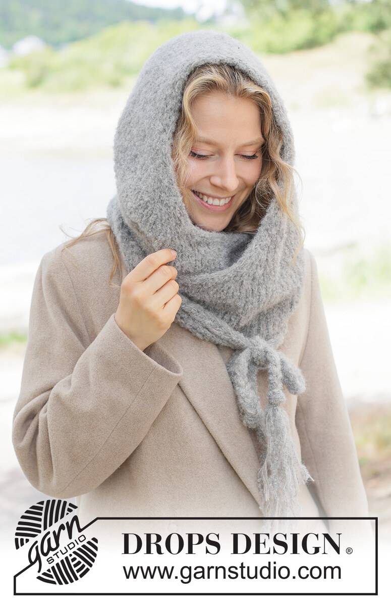 261-7 Soft Shelter Hood by DROPS Design DOWNLOAD OPSKRIFTEN HER Strikket hættetørklæde i DROPS Alpaca Bouclé og DROPS Brushed Alpaca Silk. Arbejdet strikkes oppefra og ned i glatstrik med flettede bindebånd. Pinde og tilbehør lægges i kurven separat. Se alle opskrifter fra DROPS her. ..