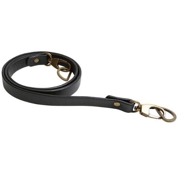 Go Handmade Taske Skulderrem 18 mm x 100 cm 1 flot skulderrem i PU læder. Bredde: 18 mm. Længde: 100 cm. Fås i 3 farver: Sort/bronze Brun/bronze Beige/sølv..