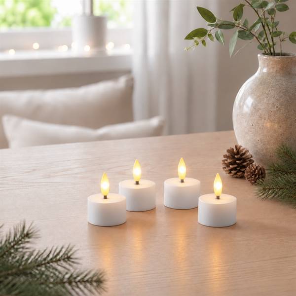 Genopladelige LED fyrfadslys 4-pak med ladebase og fjernbetjening, hvid.