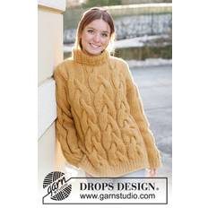 235-21 Golden Hour by DROPS Design DOWNLOAD OPSKRIFTEN HER Strikket bluse i DROPS Wish. Arbejdet strikkes nedenfra og op med snoninger, slids i siden og høj hals. Størrelse S - XXXL. Pinde lægges i kurven separat. Se alle opskrifter fra DROPS her. Se alle dame opskrifter her. Se alle strikkeopskrifter her.