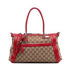 Gucci Vintage, Pre-owned, Dam, ONE Size, Förägda damtoteväska med flätade handtag och tofsdetalj