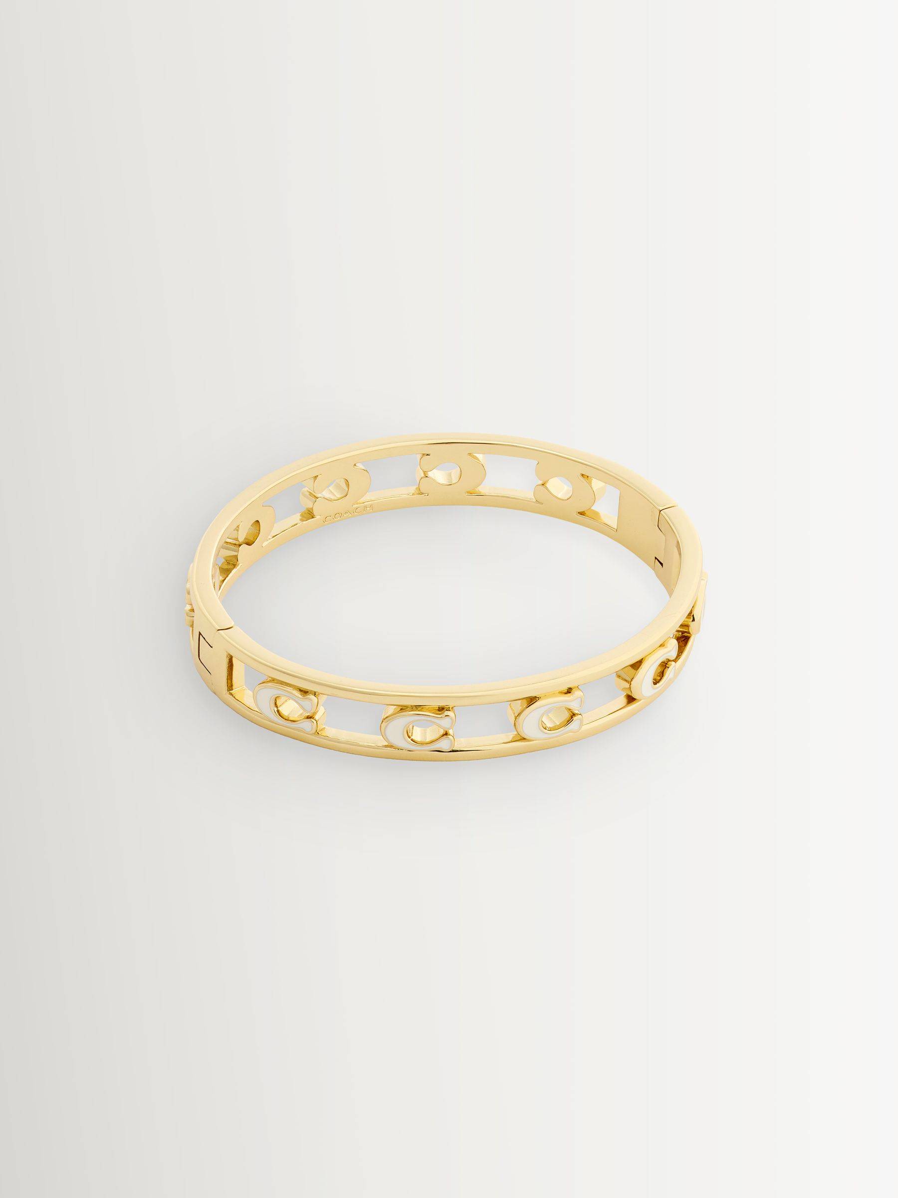 Coach COACH Gold Tone Tone Signature C Enamel Openwork Bangle Bracelet
