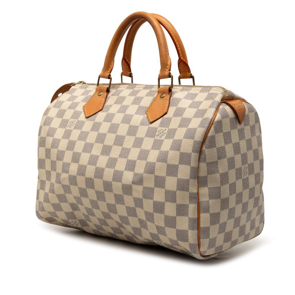 Louis Vuitton Vintage Louis Vuitton Speedy L 21cm x W 30cm x D 17cm - Håndtasker hos Magasin.