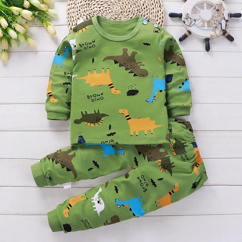 SleepBuddy – Mjukt och bekvämt – pyjamas för barn med långa ärmar Grön Dino / 73 (0–6 månader) | Pedagogiska Träleksaker