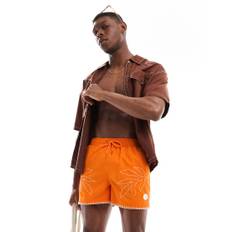 Native Youth – Orange badshorts med broderade motiv