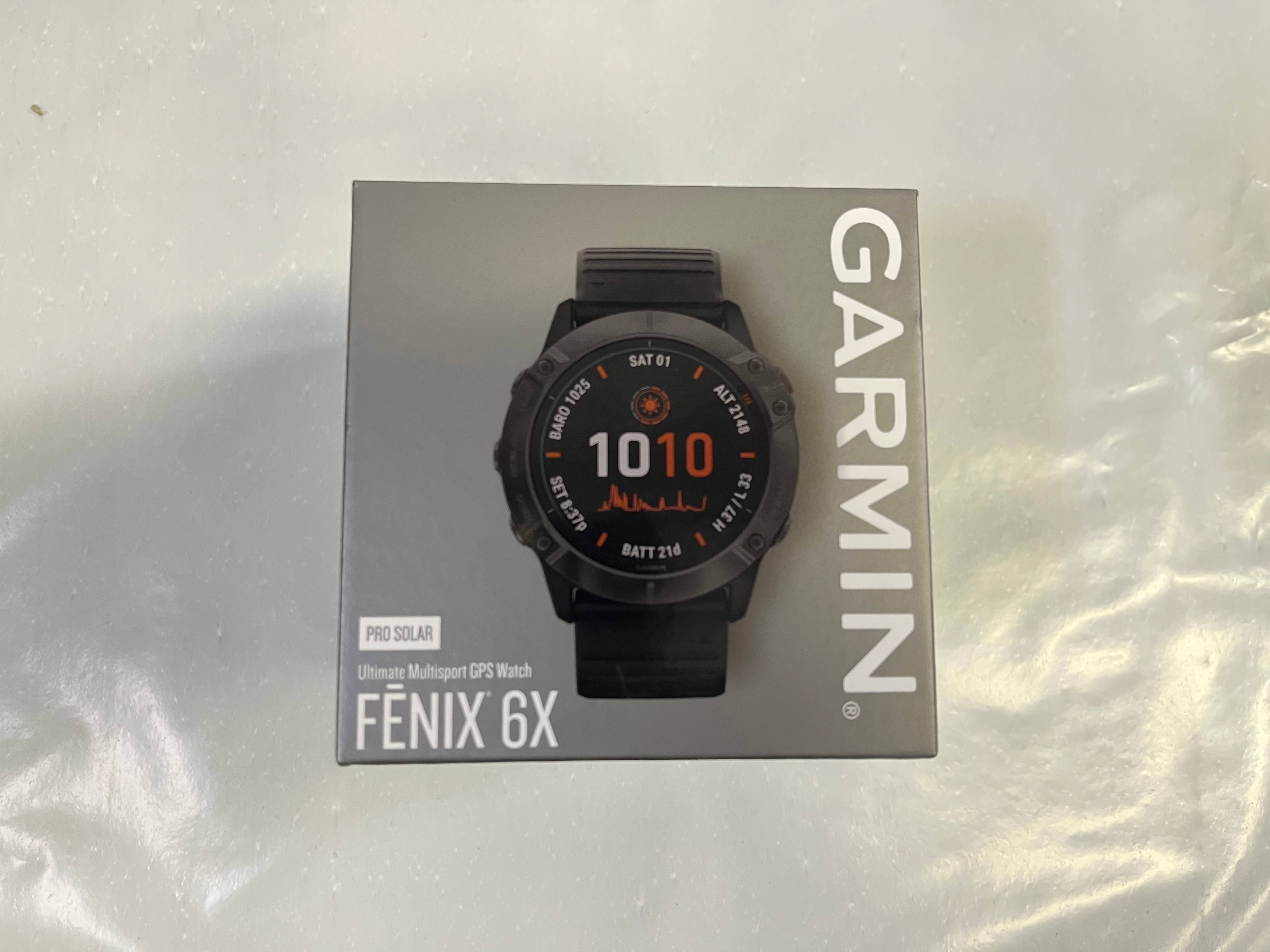Garmin Begagnad fēnix® 6X Pro Solar kolgrå titan med diamantliknande kol med svart armband
