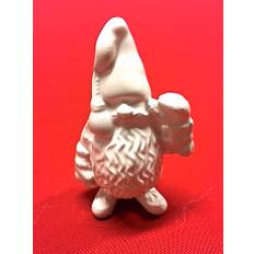 Vintertomten mini är en vit tomte i porslin från Cult design.