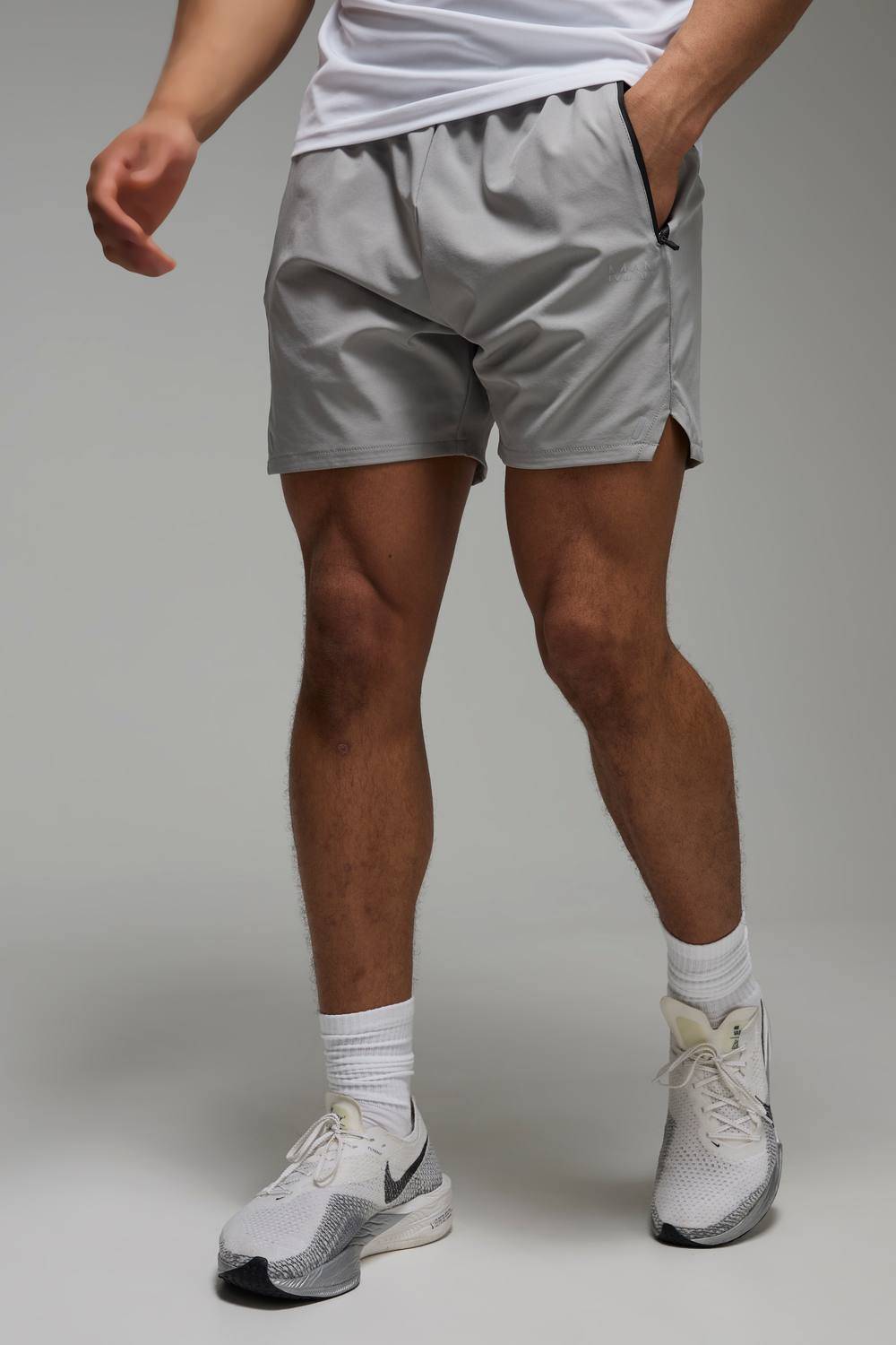 boohooMAN Men Man Active Perforated Stretch Woven Regular Fit 5inch Gym Short in Light Grey | Size: 2X-Large - 2XL