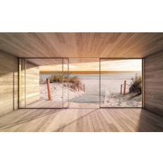 Fototapet - Udsigt fra rum med trægulv til strand med træsti under solnedgang - Vinyl 265g / 152,5x104