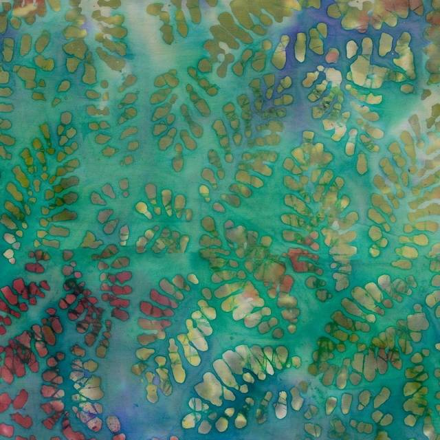 Bomulds poplin batik i irgrøn/blå med blade.