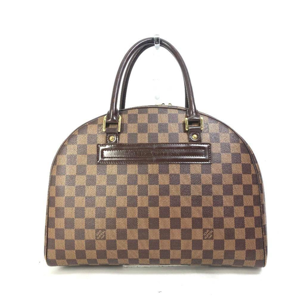 Louis Vuitton Vintage Louis Vuitton Nolita L 25cm x W 34cm x D 14cm - Håndtasker hos Magasin.