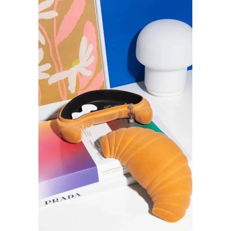 Crescent-shaped storage box