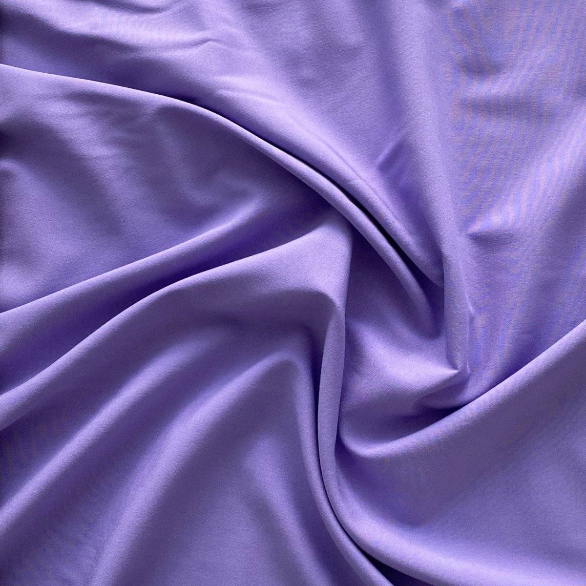 Ensfarvet fast viscose med lidt stræk lilla