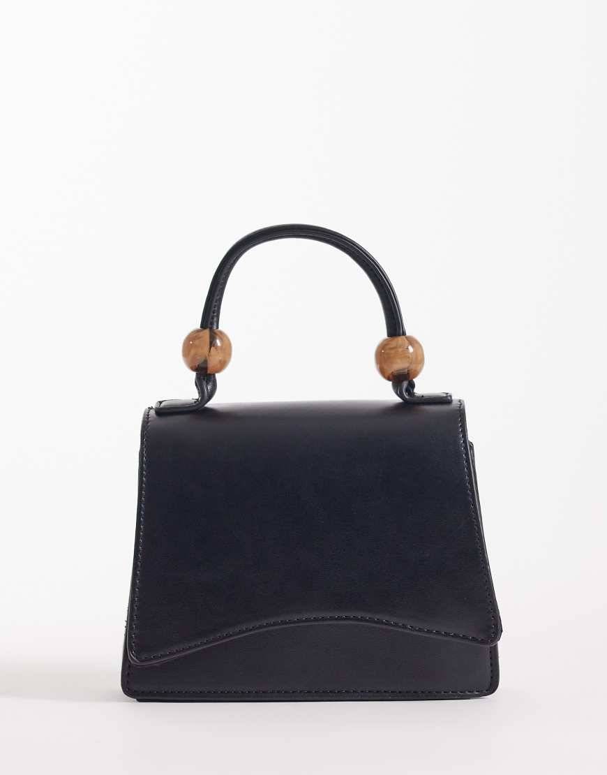 ASOS DESIGN - Sort crossbody-taske med aftagelige rem, hank øverst og kugler i resin - No Size