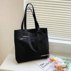 1 st Stor kapacitet Canvas tygväska Casual Unisex Enfärgad Casual Lätt daglig användning Slitstark axelväska med bokstavstryck Lätt bärbar canvasväska - Svart (En-Storlek)