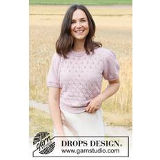 222-14 Flower Wish by DROPS Design DOWNLOAD OPSKRIFTEN HER Strikket bluse i DROPS Alpaca. Arbejdet strikkes med hulmønster og korte pufærmer. Størrelse S - XXXL. Pinde og tilbehør lægges i kurven separat. Se alle opskrifter fra DROPS her. .