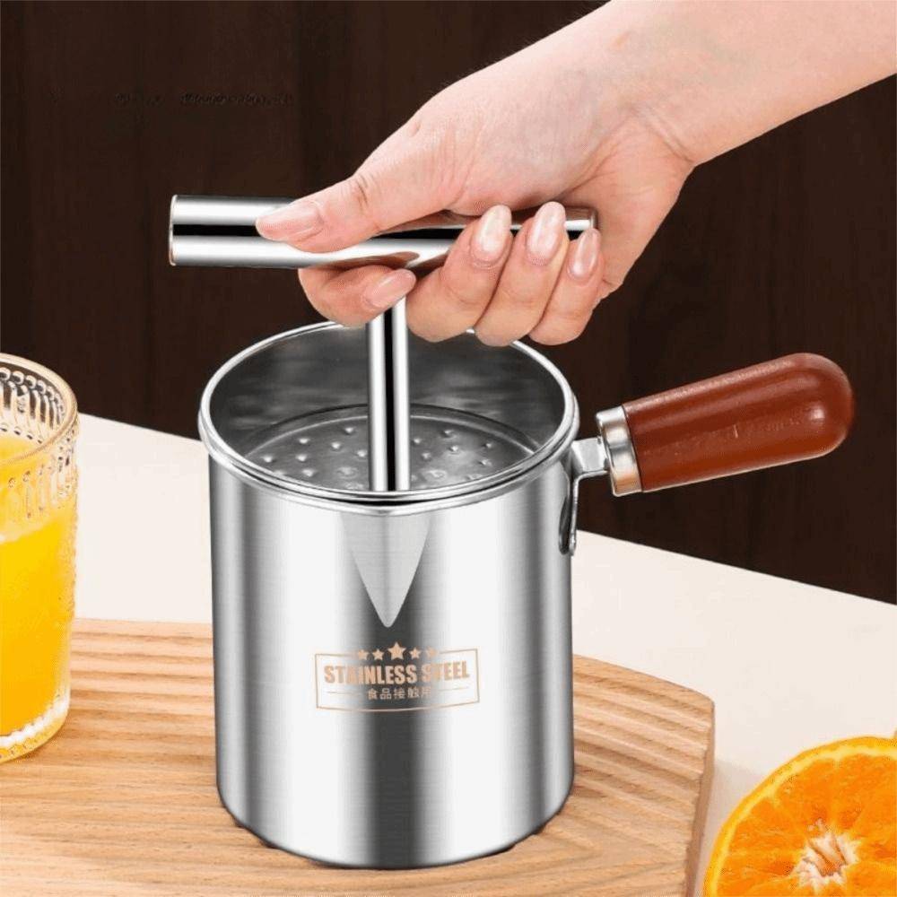 Manuell frukttryckare i rostfritt stål med sidohandtag och fruktköttsseparator för juicetillverkning silver