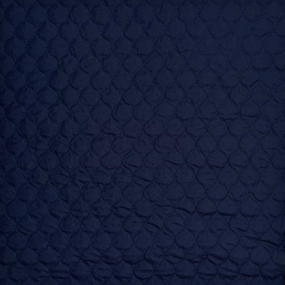 Quilt i små felter marine
