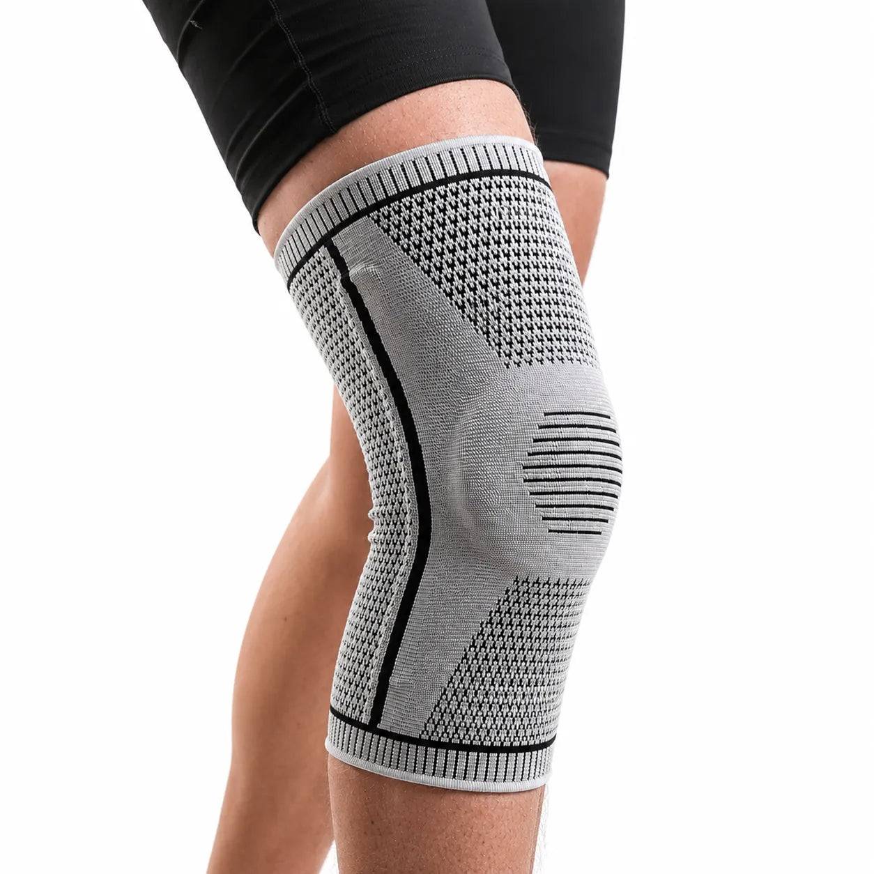 Knäskydd med fjädrar och silikonstöd för patella