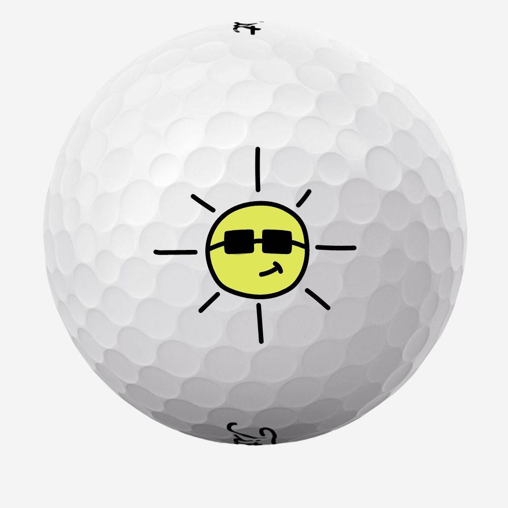 Golfbolde med sol med solbriller