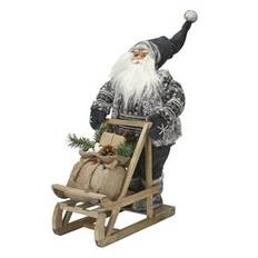Jultomte åker släde