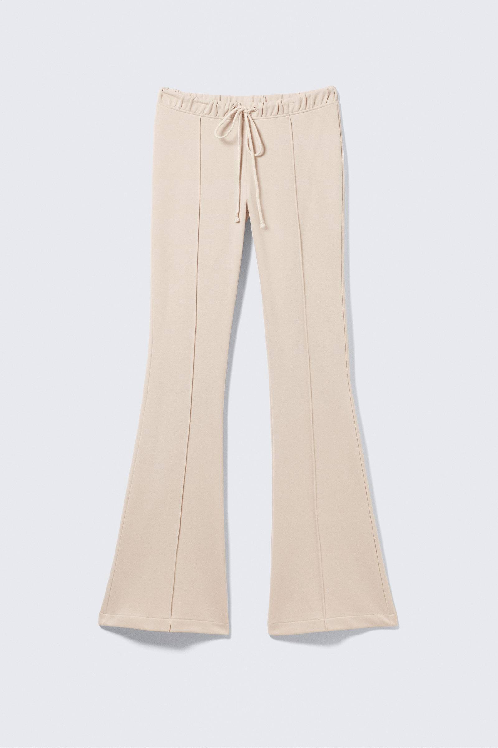 Sweatpants mit mittelhohem Bund, Schlag und Biesen