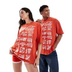 ASOS DESIGN - Unisex - Oversized T-shirt i forvasket rød med licenseret Coca-Cola-print foran