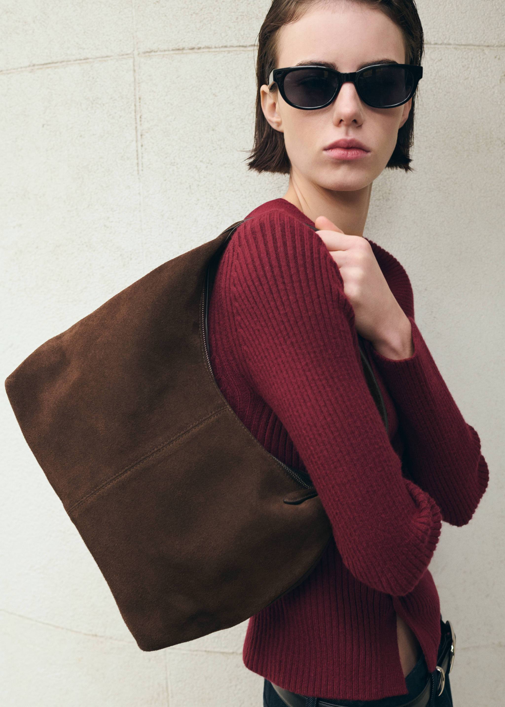 Suede shoulder bag with stitching