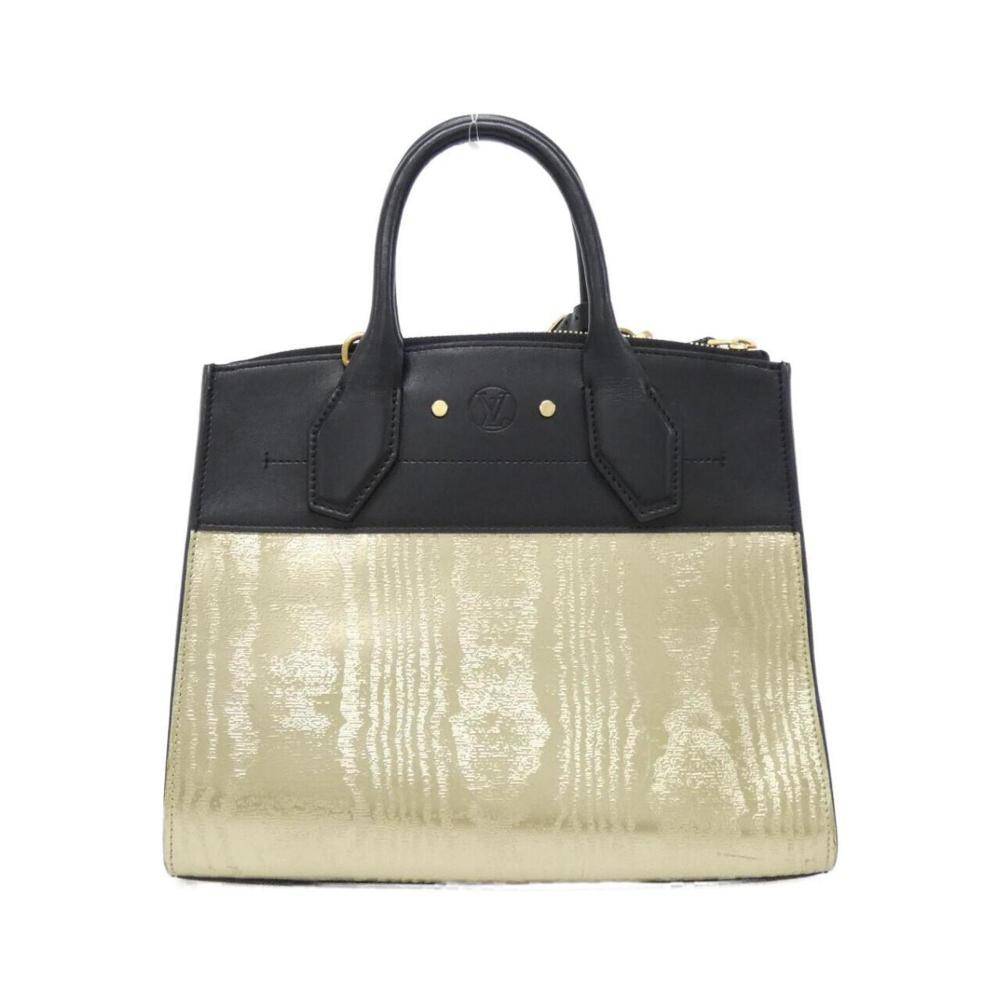 Louis Vuitton Vintage Louis Vuitton City Steamer L 23cm x W 26cm x D 13cm - Håndtasker hos Magasin.