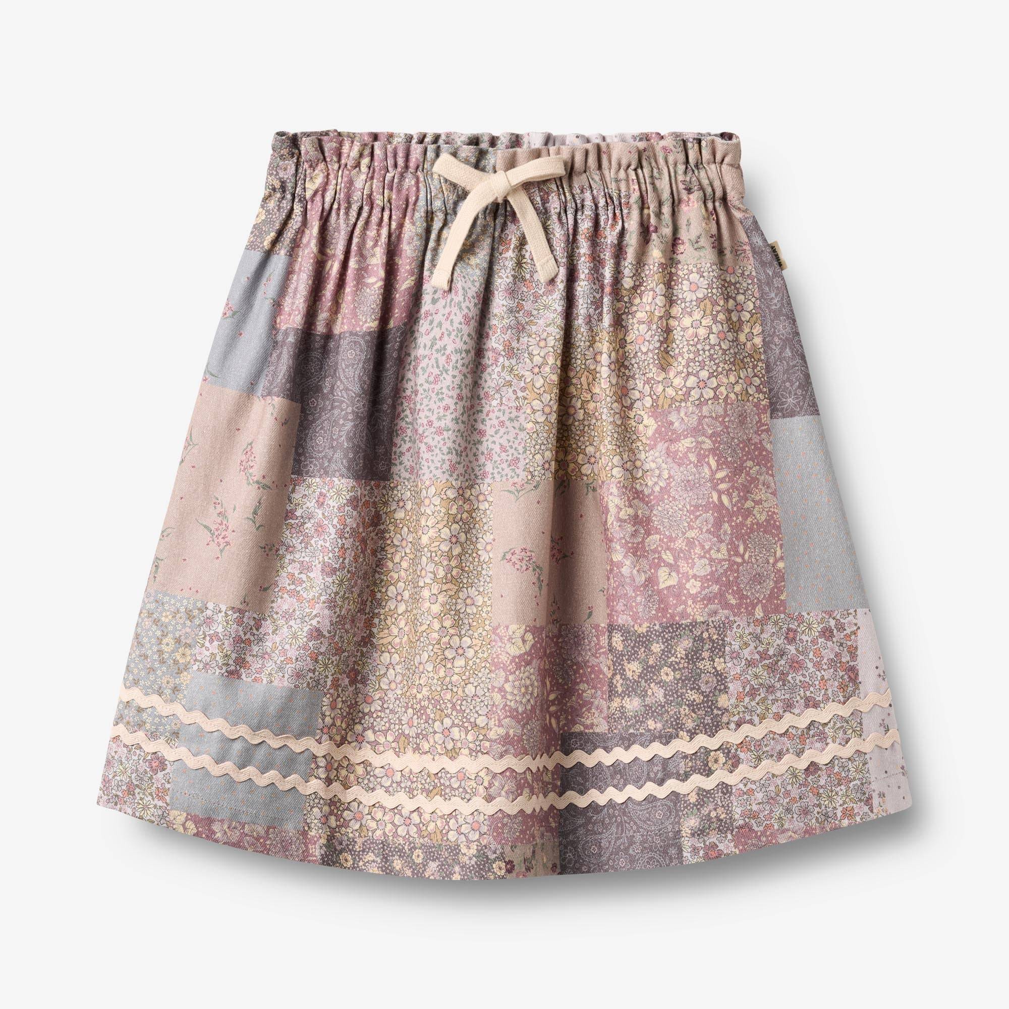 WHEAT® - Nederdel Nya - patchwork flowers - Str 128.