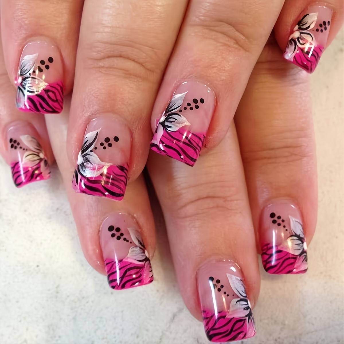 Set Of 24 Short Square Fake Nails With A Nail File And For Nail Art, Featuring Black , Pink French Tips, And White Floral Patterns. This Easy, Stylish, And Use