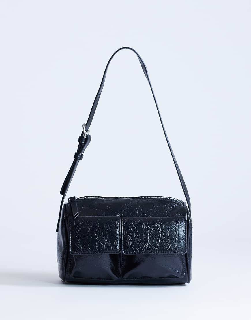 Topshop - Safia - Sort skuldertaske med lommer foran - One Size