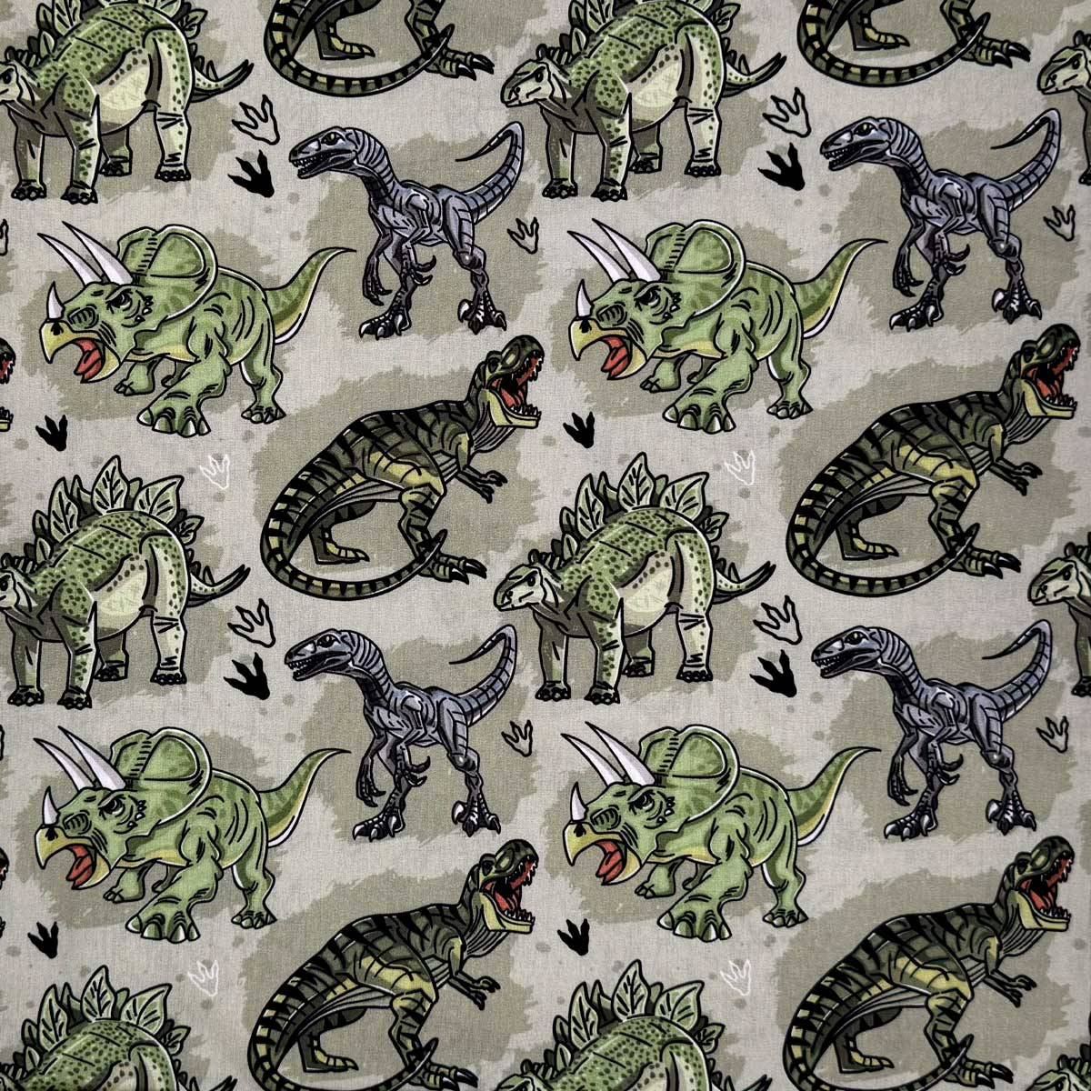 Fast bomuld med Dinosaur i camouflage