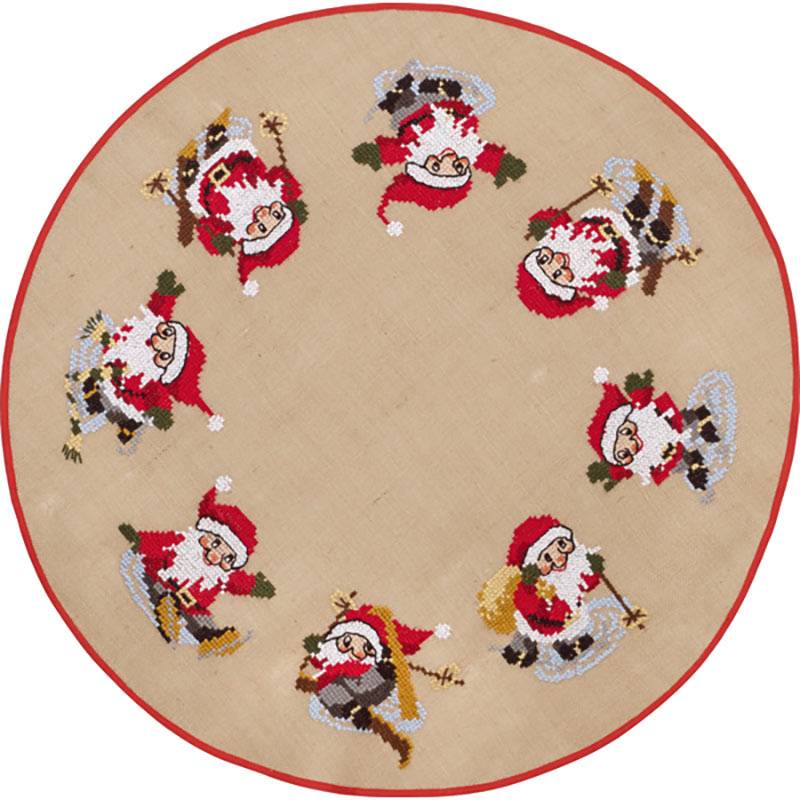 Juletræstæppe Broderikit Nisseløjer Broderikit med et fint nissemotiv Kittet inderholder en naturfarvet jute med en diameter på 100 cm samt broderigarn til at fremstille det nydelige motiv.