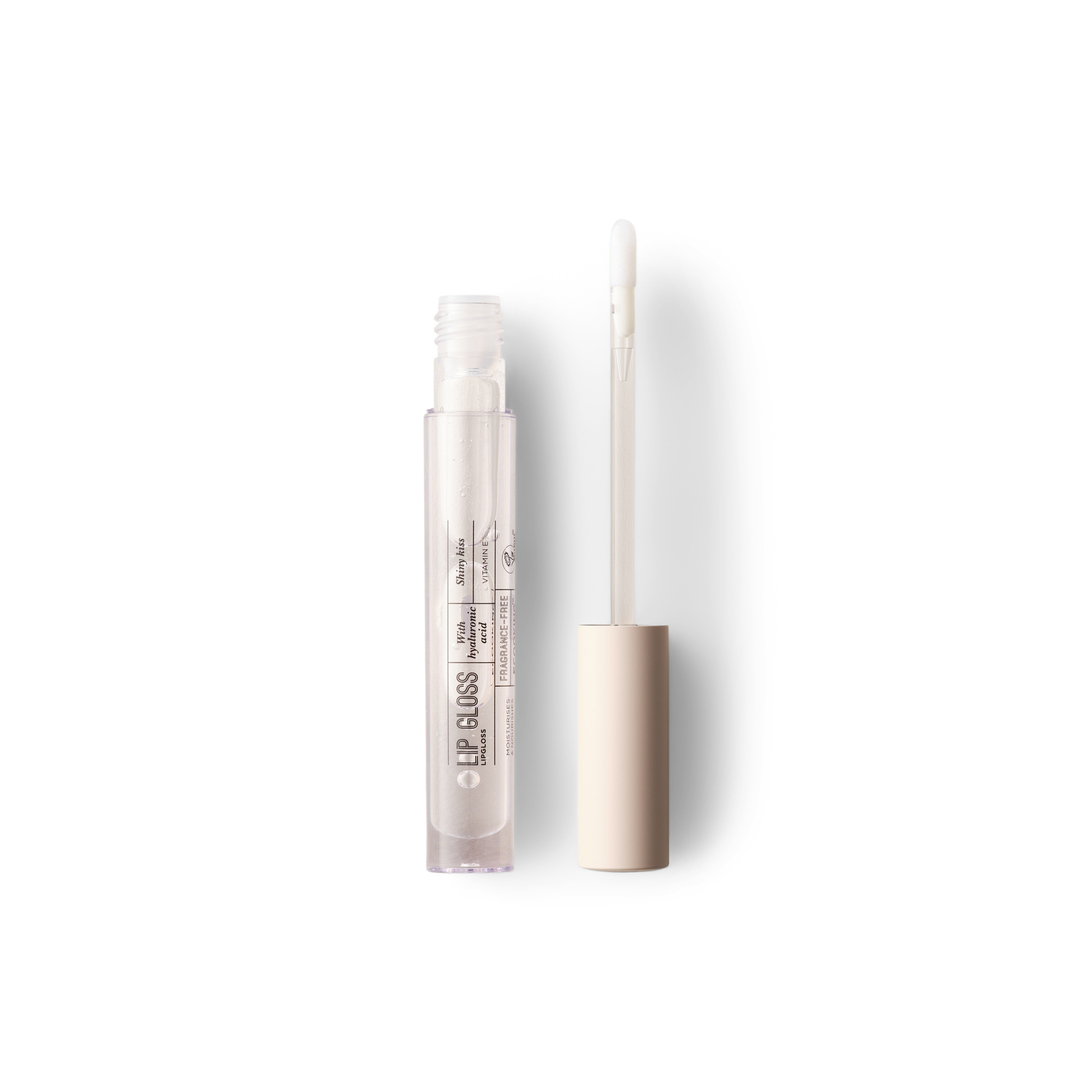 Lip Gloss — Vores Lip Gloss giver giver glans og fugt til læberne, med hyaluronsyre og plumping effekt og blød konsistens, der ikke klistrer. - Blush nude