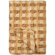 Quilt med orange og rødt blokmønster