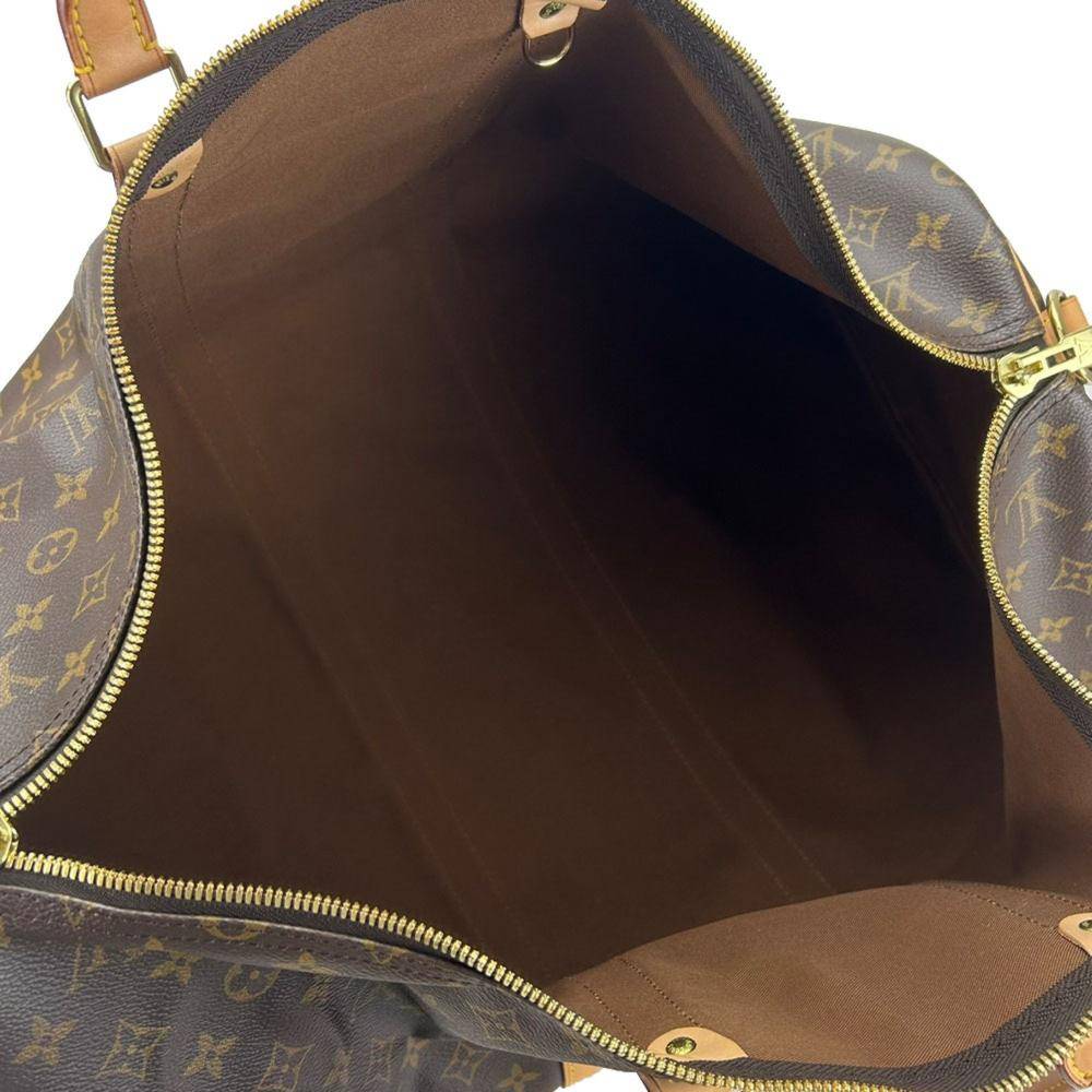 Louis Vuitton Vintage Louis Vuitton Weekend Bag L 30cm x W 55cm x D 26cm - Louis Vuitton Vintage hos Magasin.