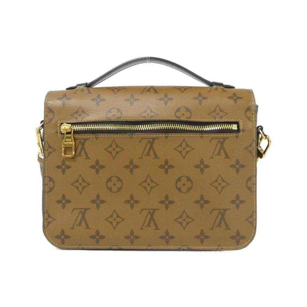 Louis Vuitton Vintage Louis Vuitton Pochette Accessoires L 19cm x W 25cm x D 7cm - Håndtasker hos Magasin.