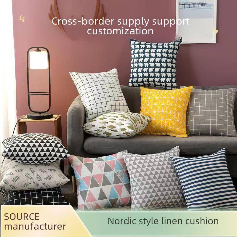 Kuddfodral i linne i nordisk stil med logotyp för hem och soffa