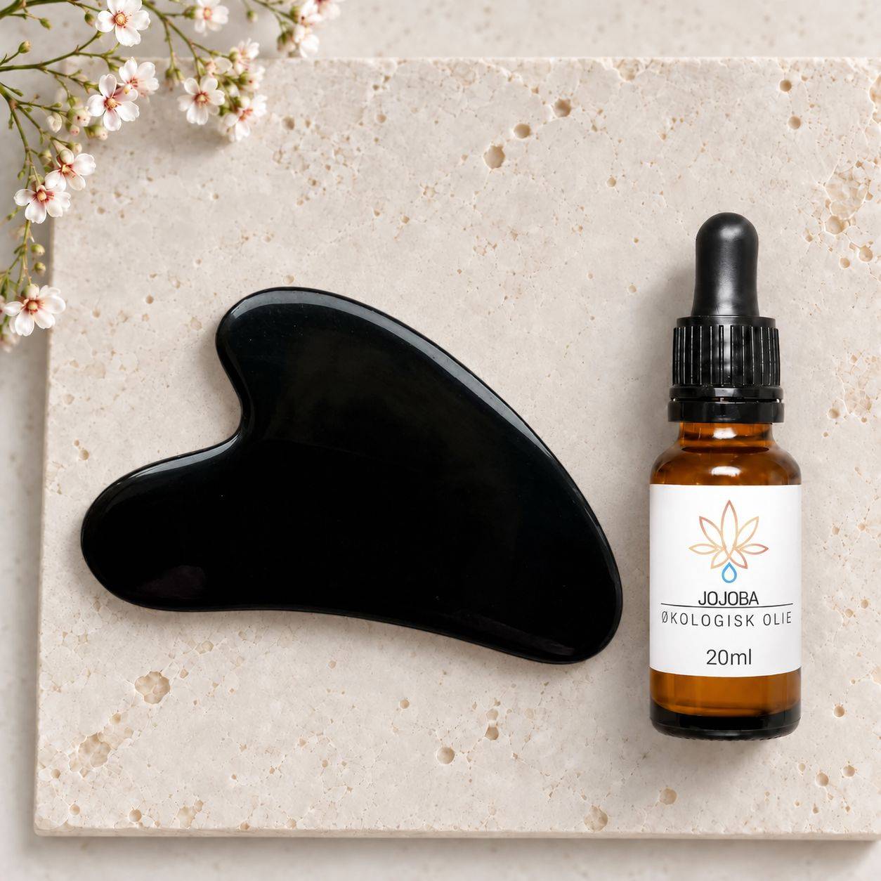 Gua Sha kit – Emma i A-grade obsidian med jojobaolie.