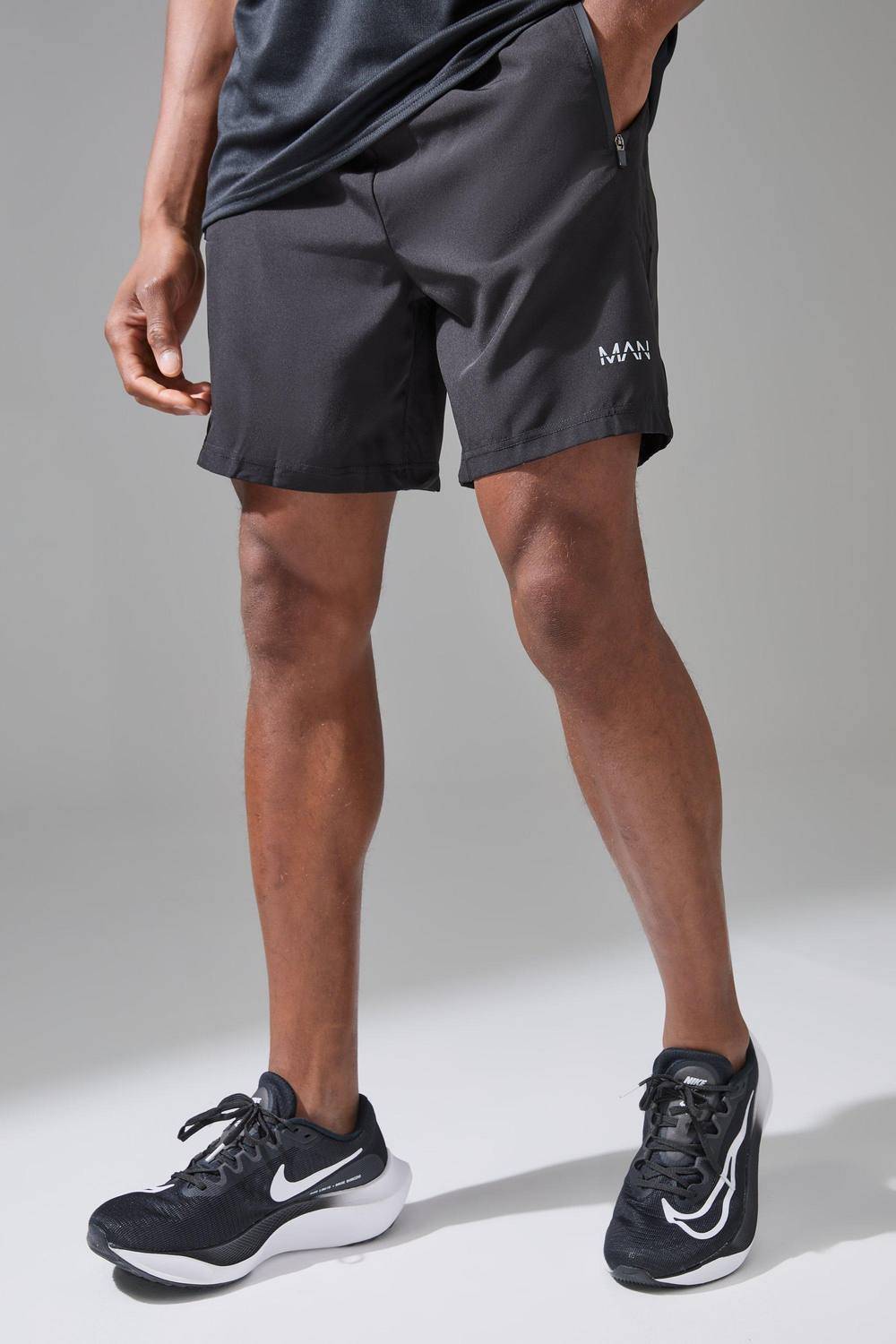boohooMAN Men Man Active Stretch Woven Regular Fit 7inch Gym Short in Black | Size: 2X-Large - 2XL