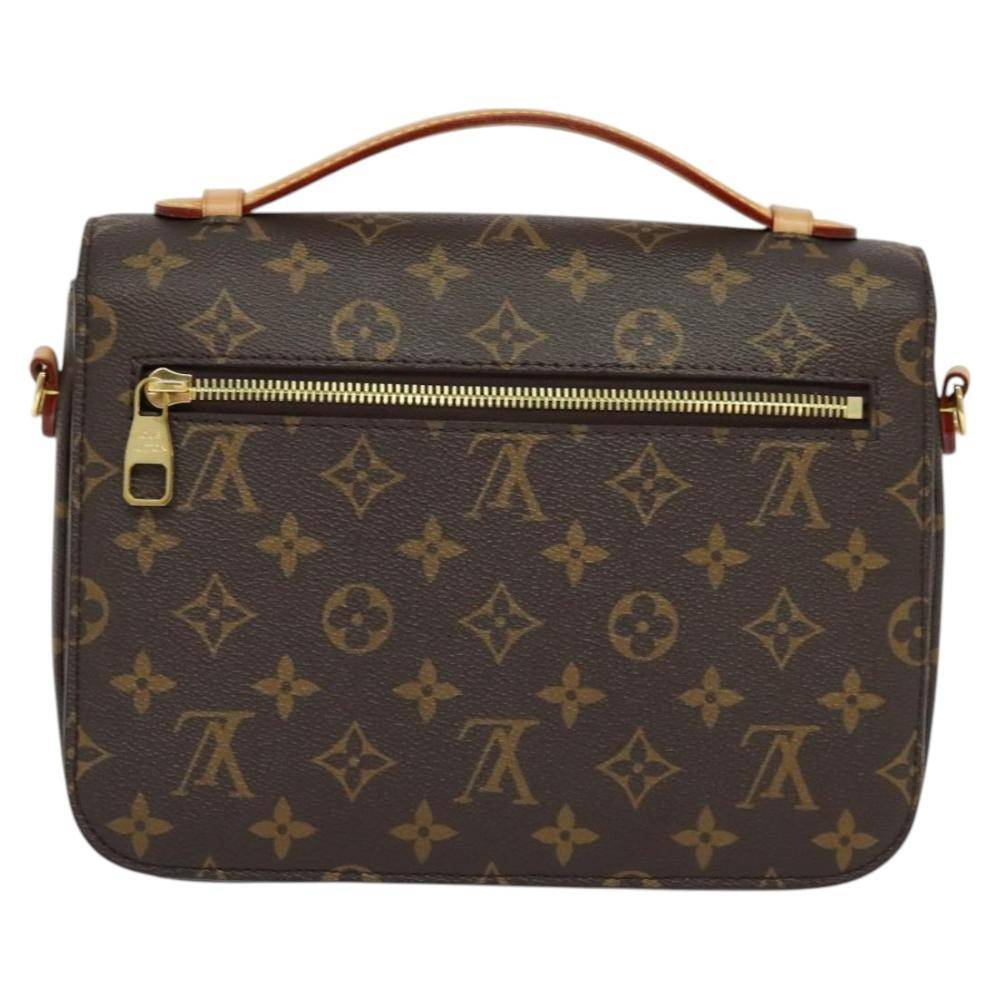 Louis Vuitton Vintage Louis Vuitton Pochette Homme W 25cm x H 19cm x D 7cm - Håndtasker hos Magasin.